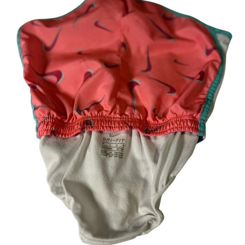 Girls Nike Coral and Teal Dri-FIT Shorts. Size L. (6-7)